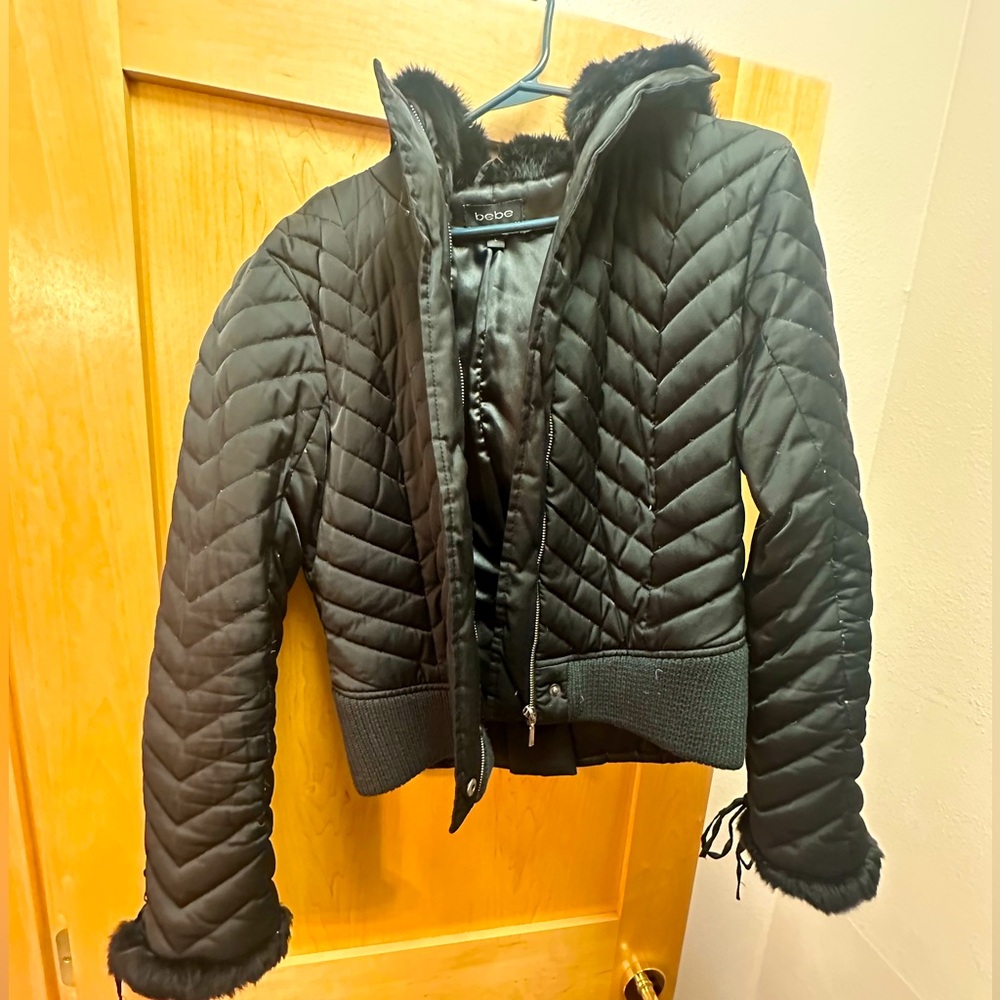 Circa 2005 Bebe bomber jacket. Fur hood and cuffs. Great condition.